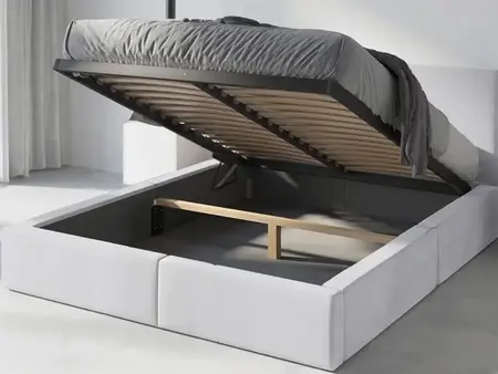 Białe łóżko tapicerowane